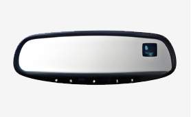 A rear view mirror with the reflection of a car in it.