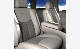 A picture of the back seats in a car.